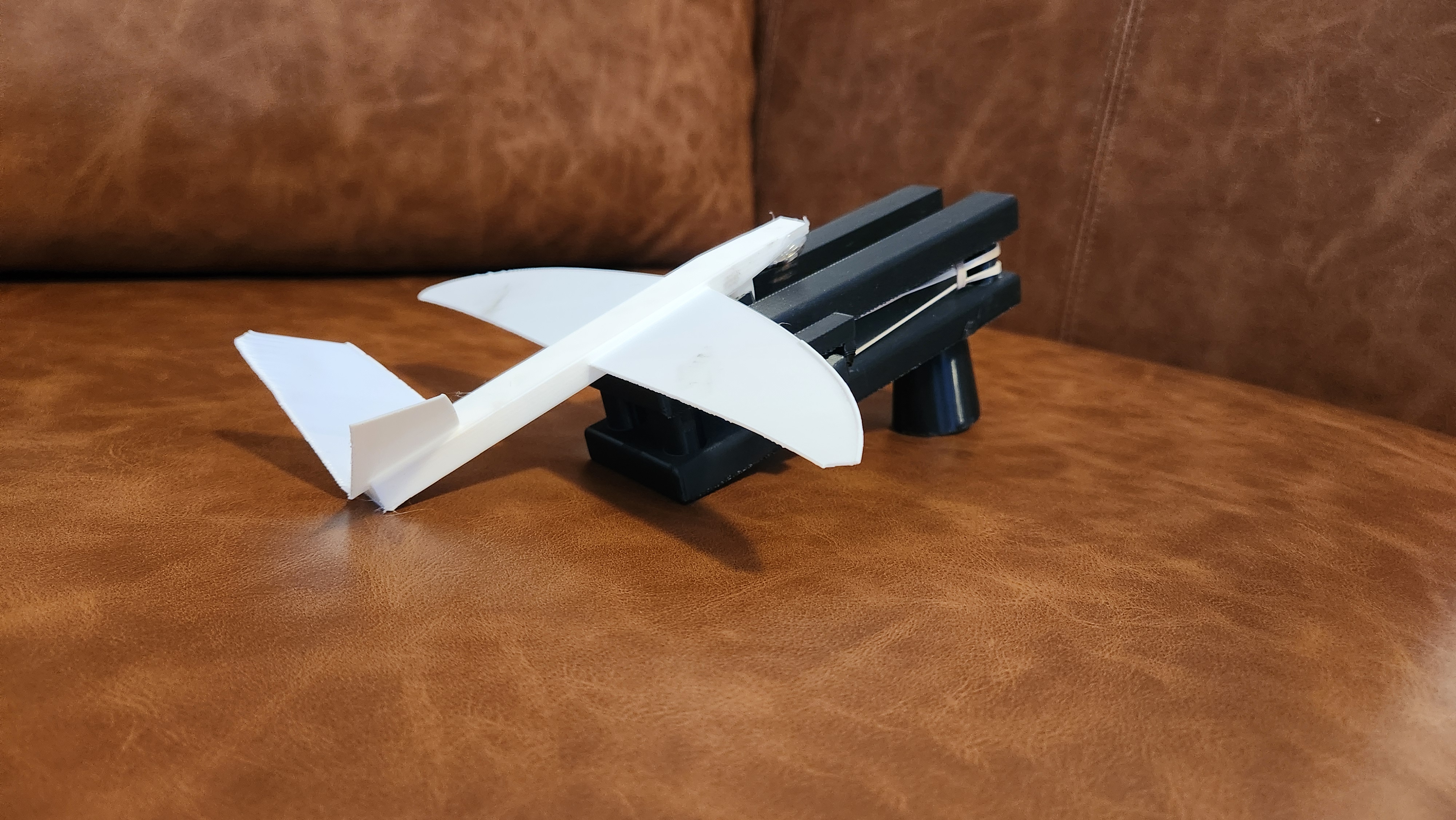 Glider with print in place handheld launcher