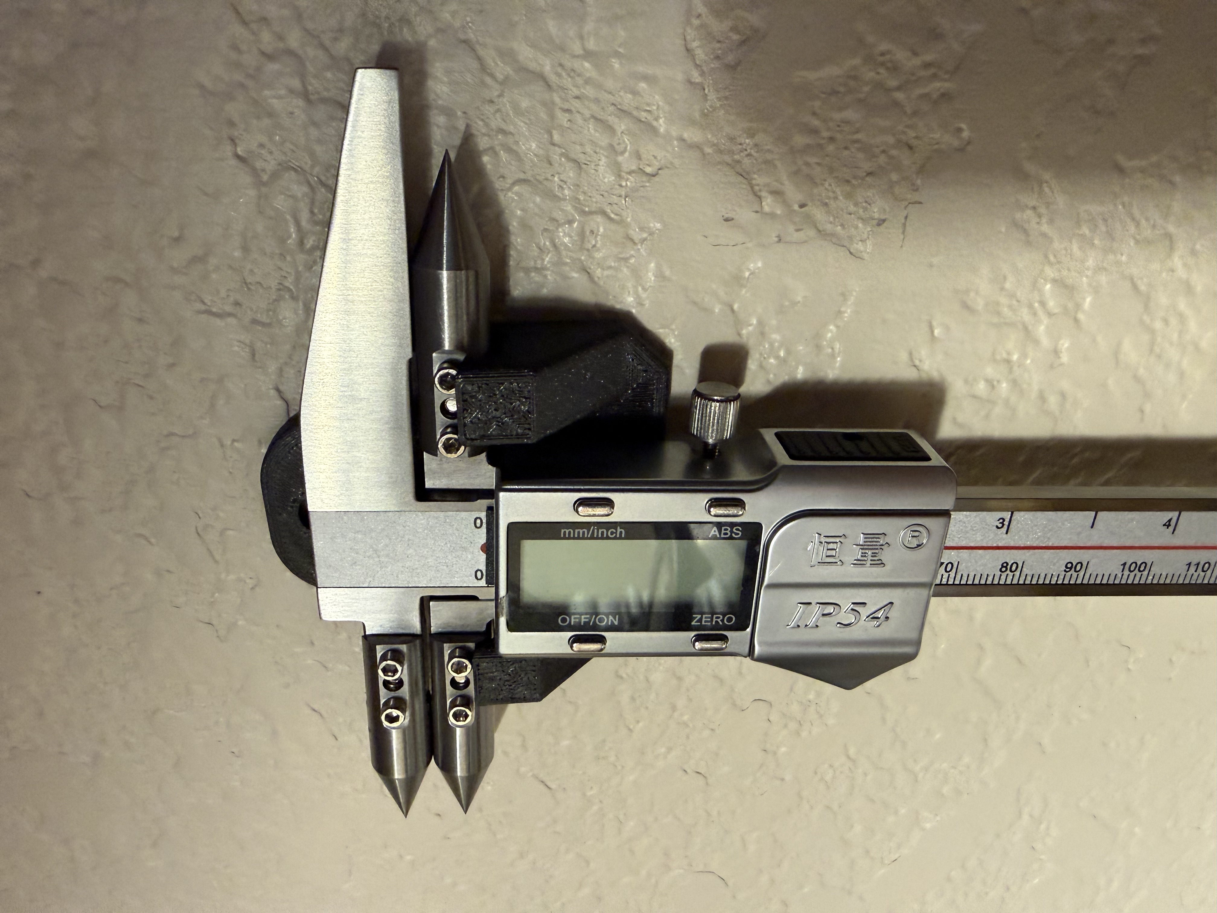 Caliper wall mount