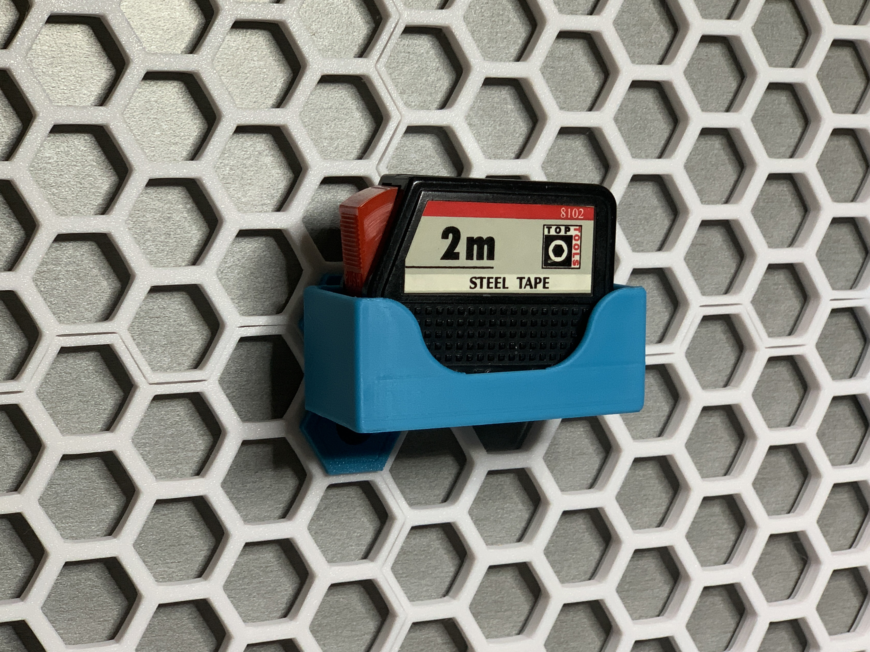 Honeycomb Storage Wall measuring tape holder