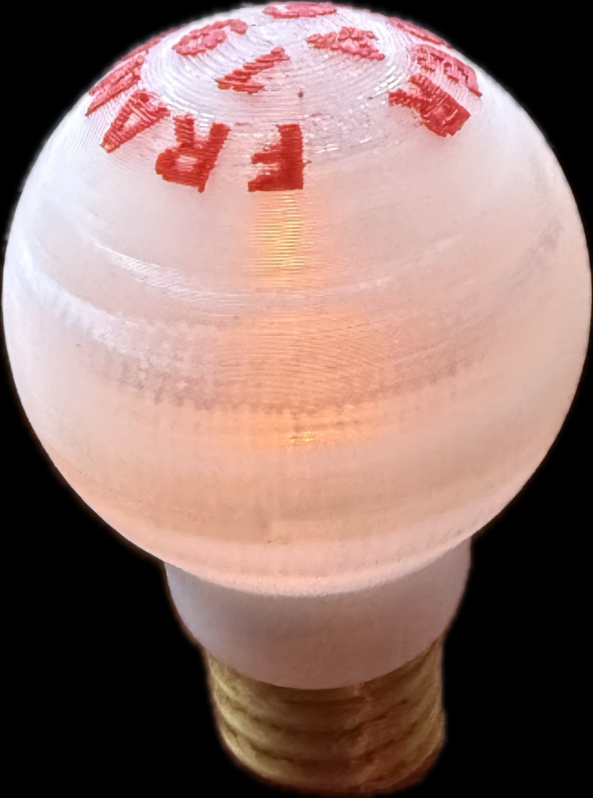 Glühlampe als Flaschenverschluss und Tischlampe