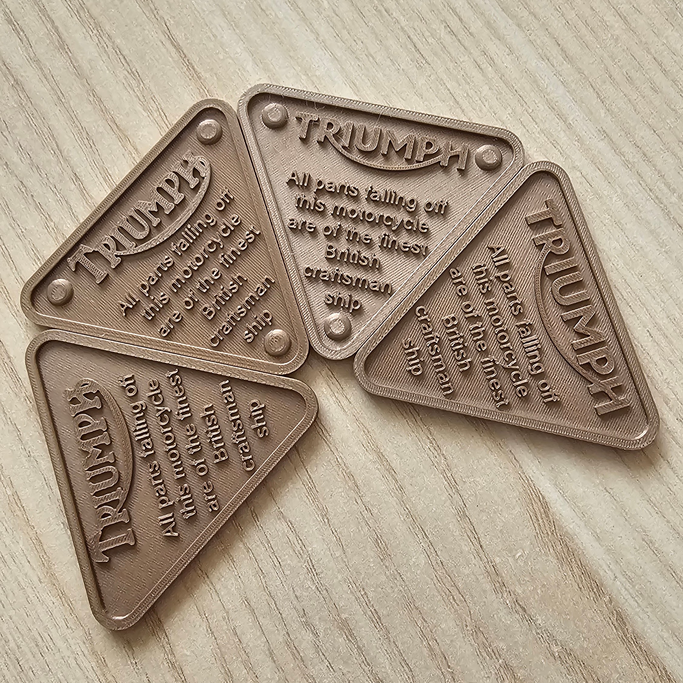 Triumph Motorcycle Badge - "British Craftsmanship" Joke Plate