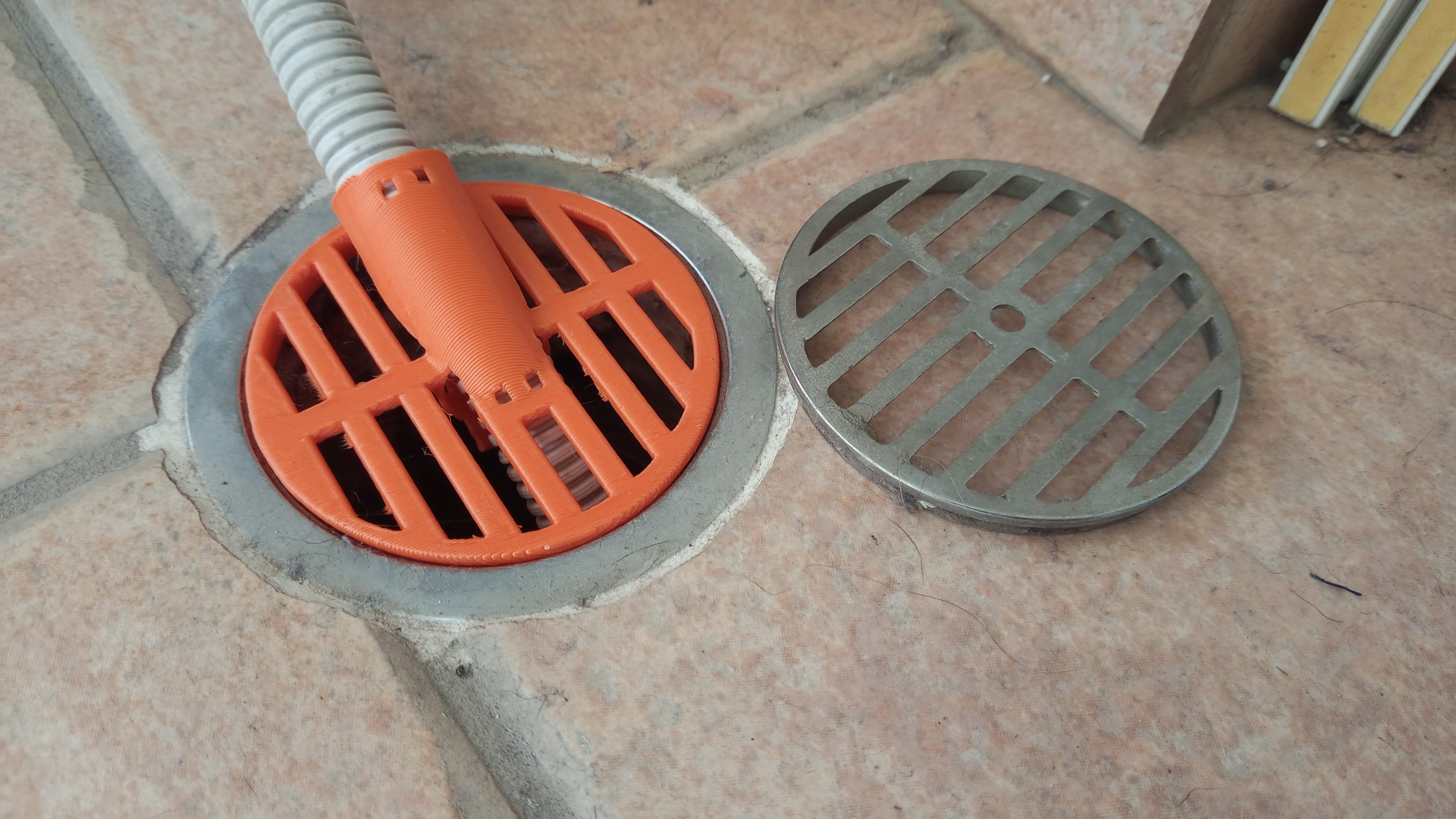 Floor drain cover with AC hose inlet