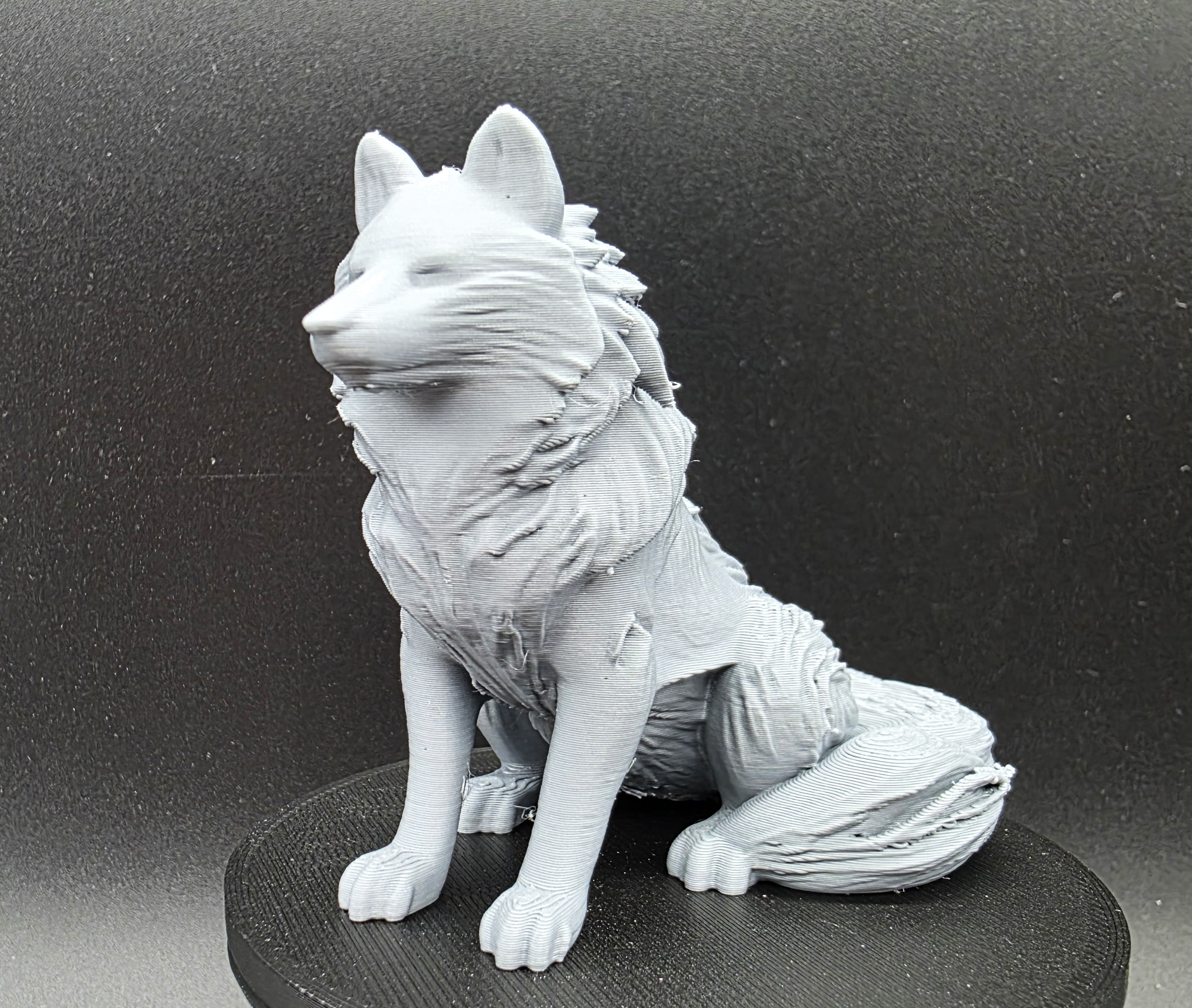 Seated Arctic Wolf Figure