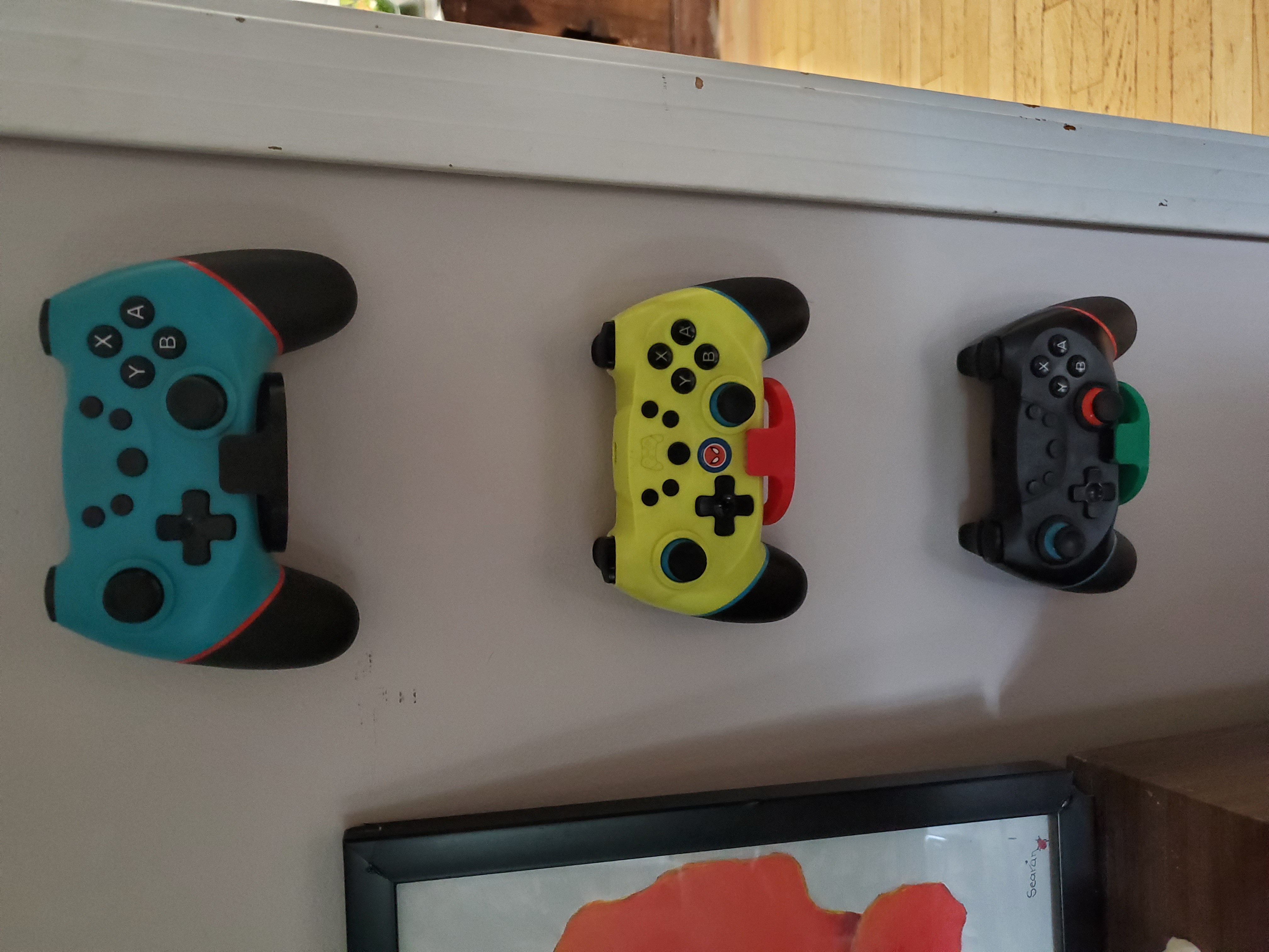 Universal gaming controller wall mount