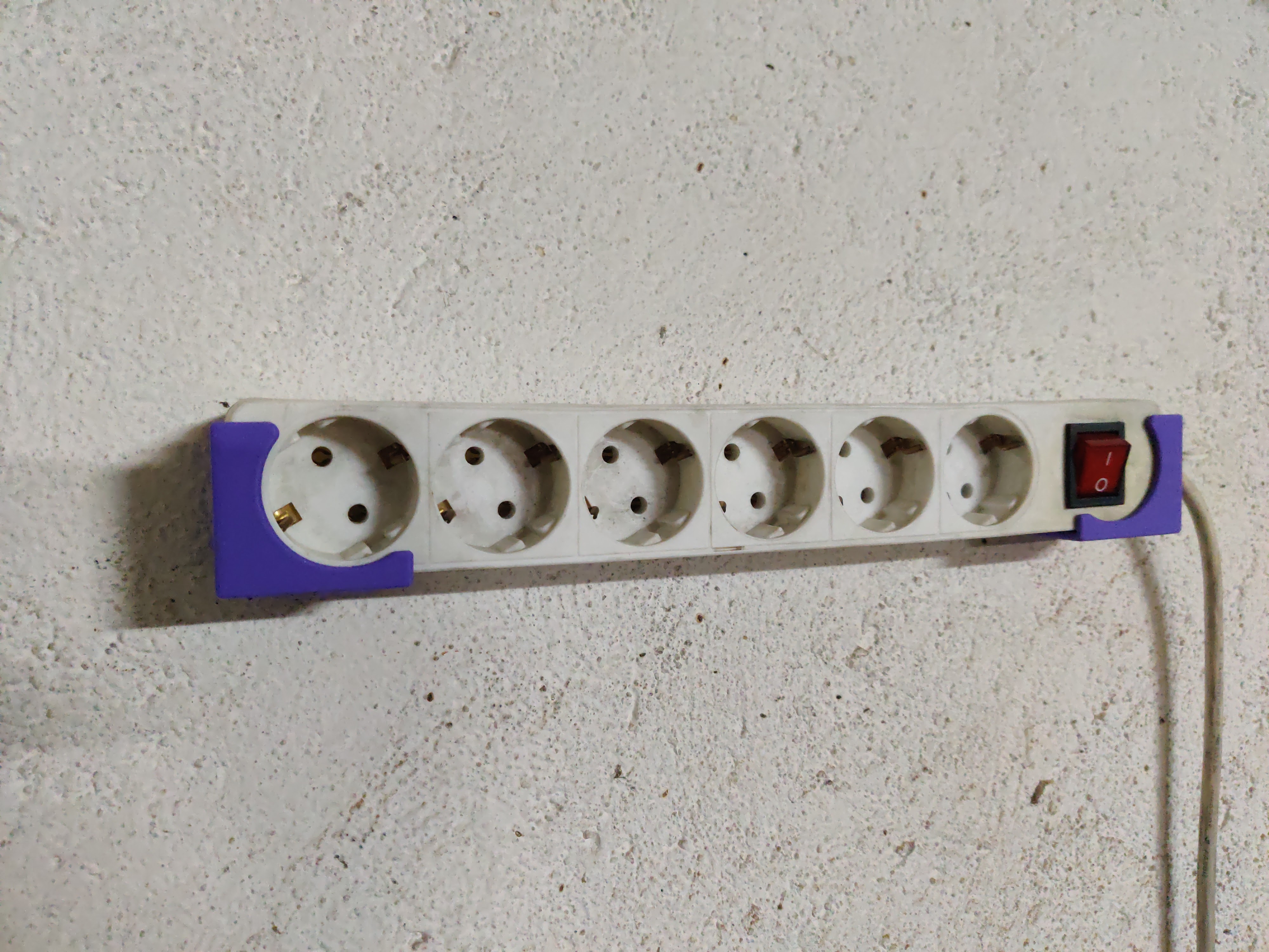 Power strip wall mount holder