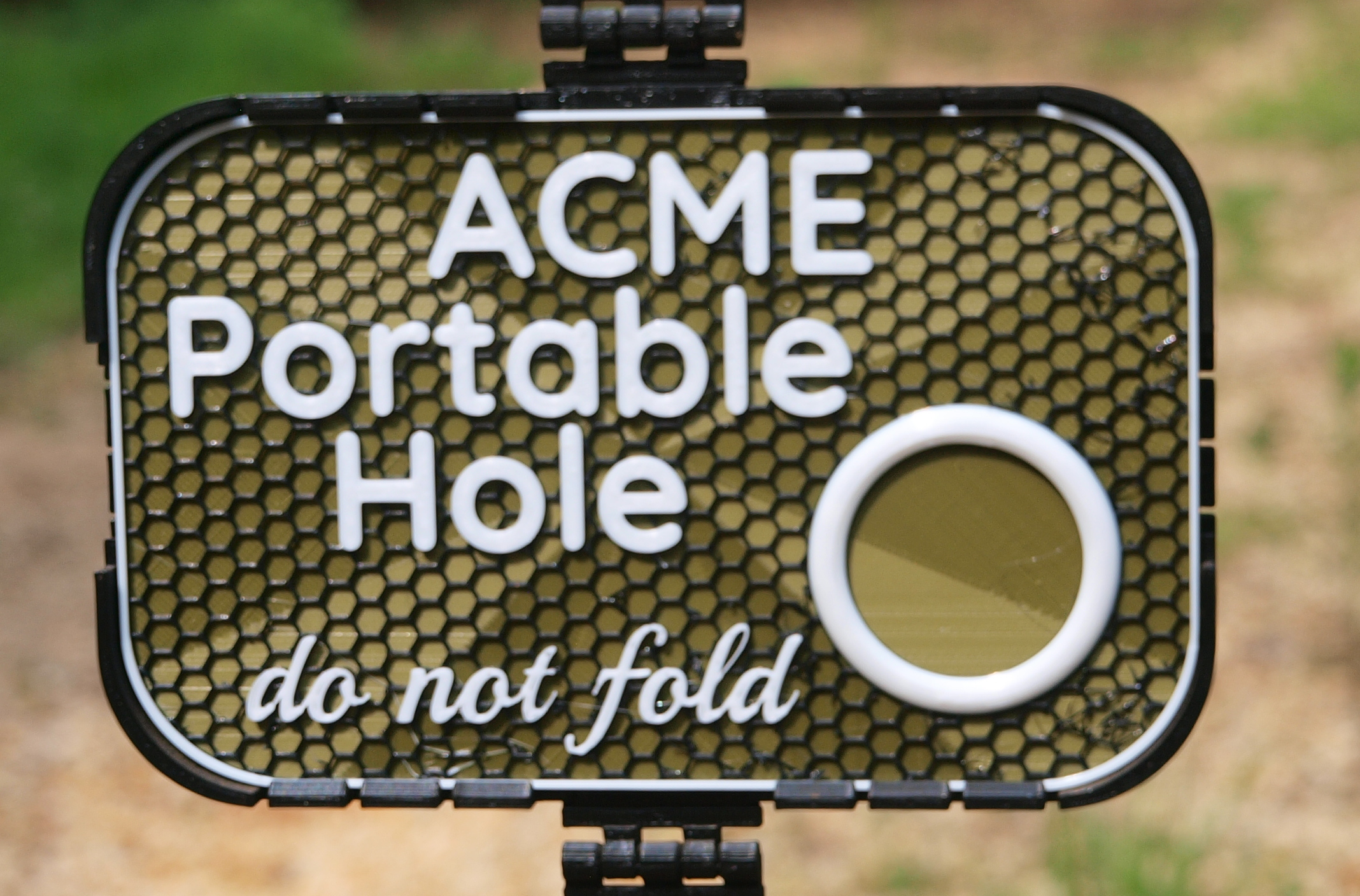 ACME Portable Hole sign