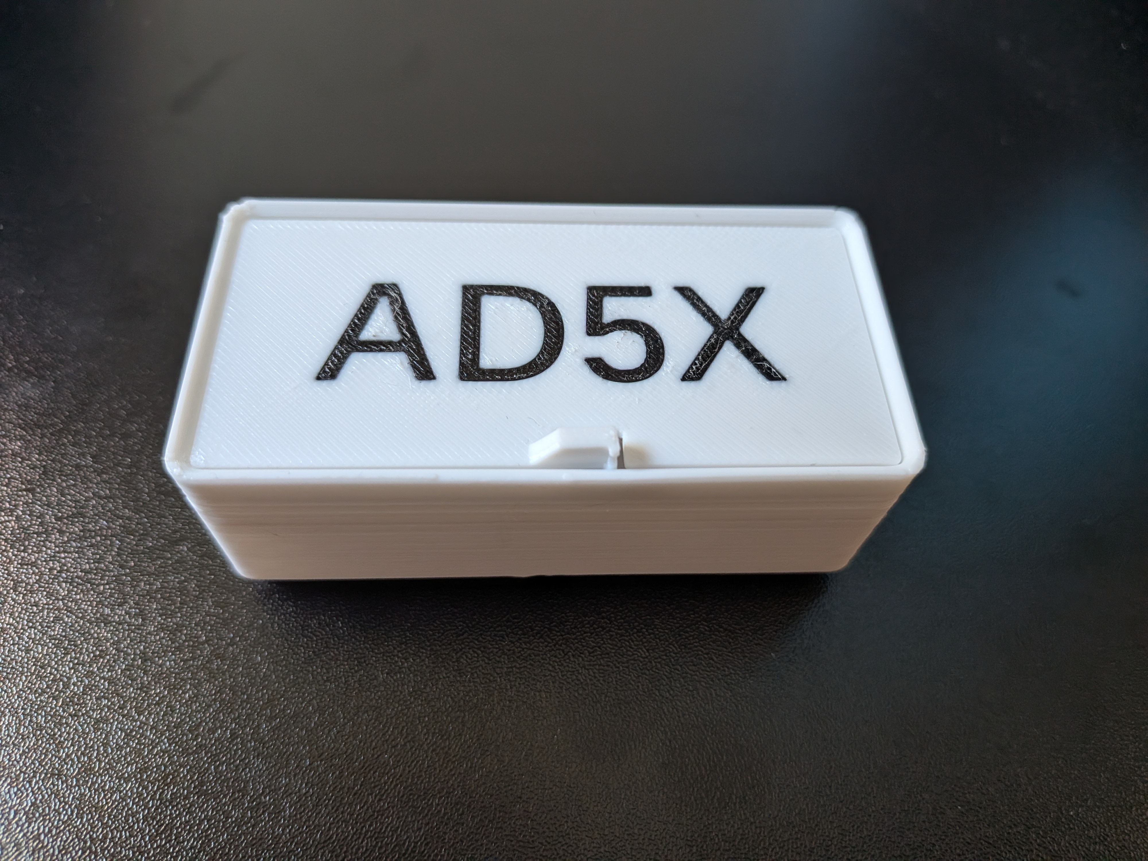 Gridfinity nozzle bin with replaceable labels + lid, for Flashforge AD5X — miniatura 3