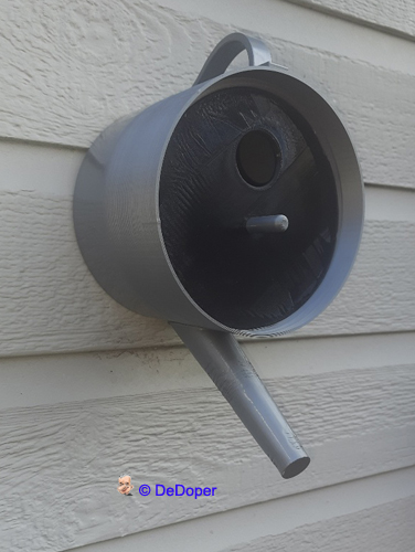 Watering can birdhouse