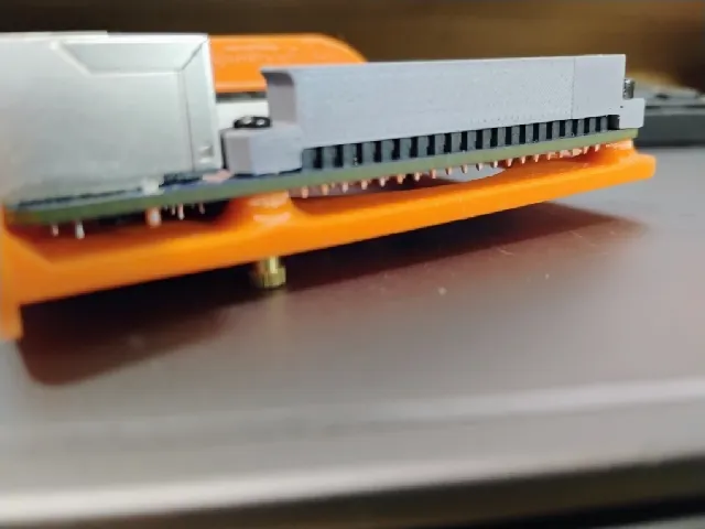 Raspberry Pi GPIO pin protectors with screw holes